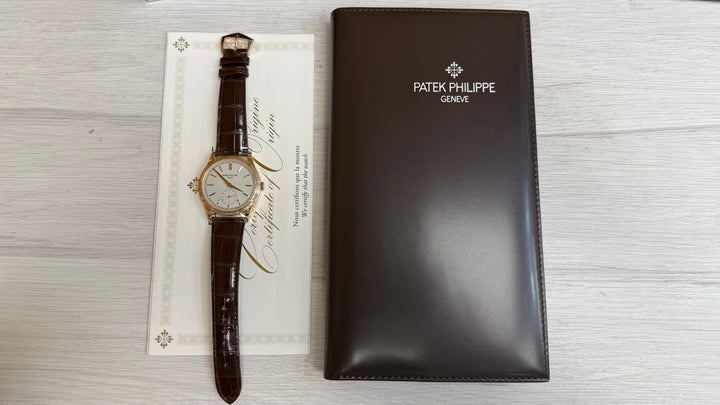 Patek Philippe Calatrava Manually Wound Mechanical Movement Silver Dial on Strap 6119R-001 Papers 2026