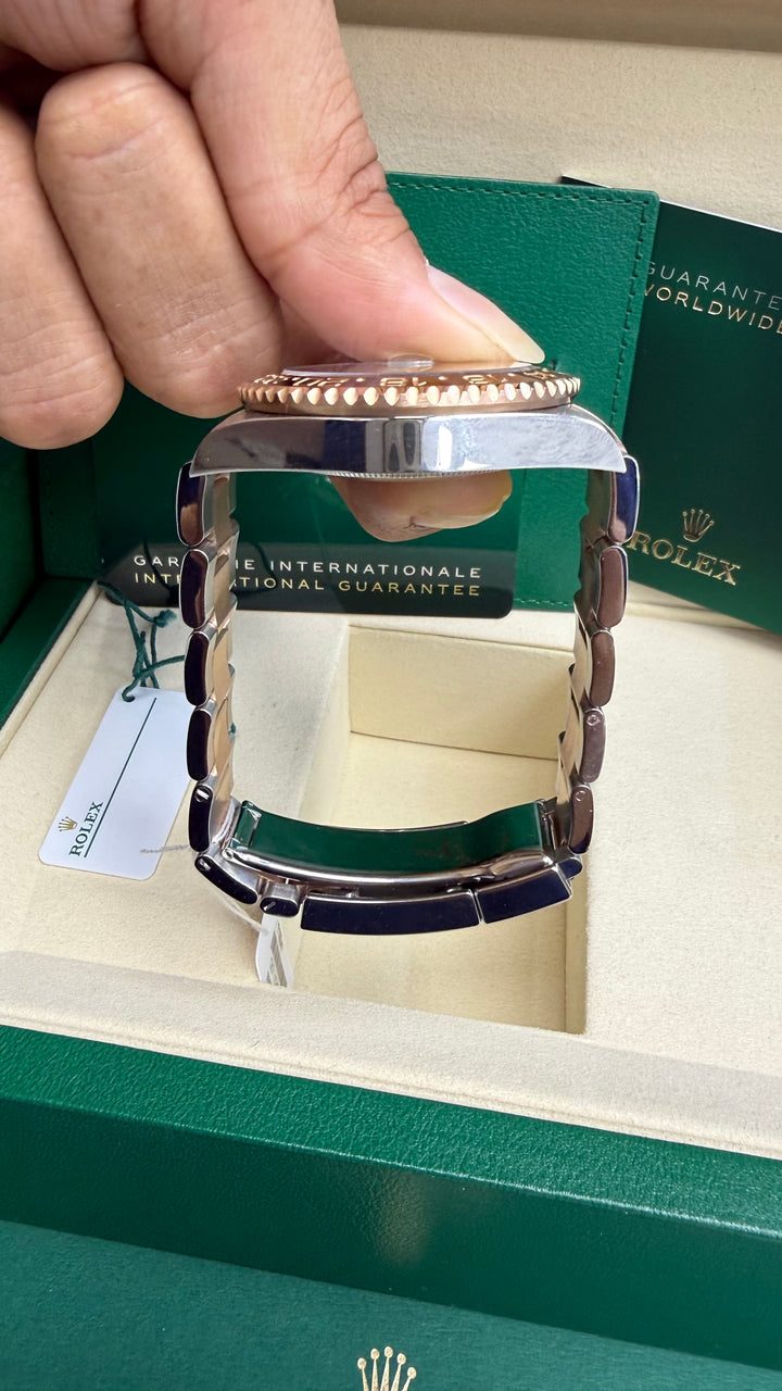 Rolex GMT-Master II "Root Beer" Black Dial on Oyster 126711CHNR Card 2021